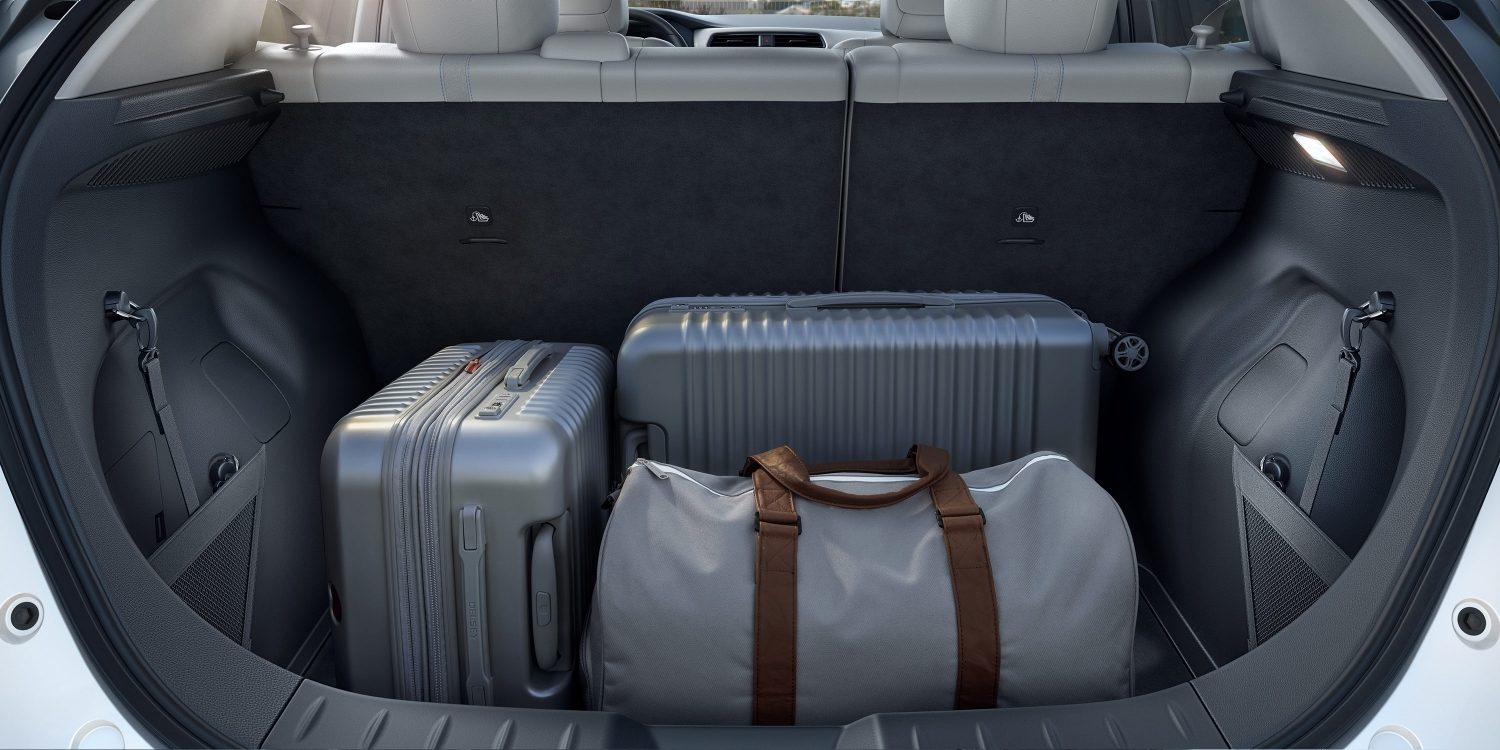 Nissan LEAF interior showing luggage in trunk