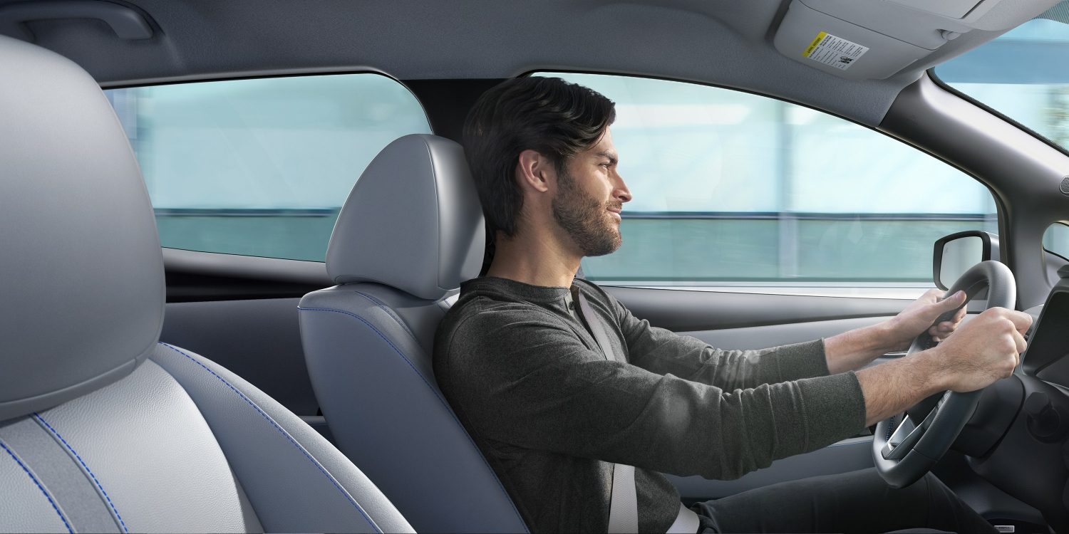 Nissan LEAF interior with man driving