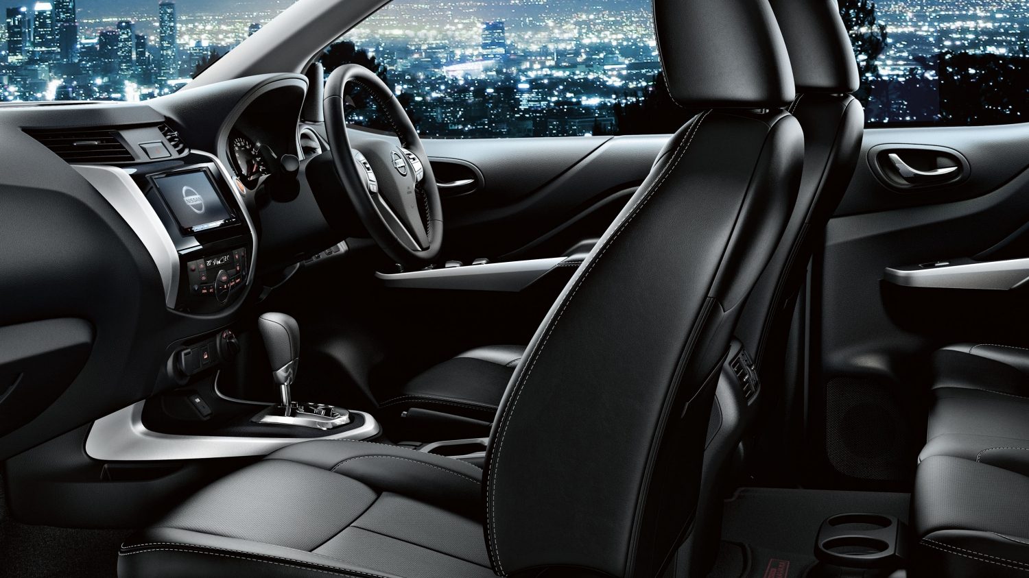 Nissan Navara interior profile in front of cityscape