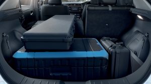 Nissan LEAF with 60/40 split rear seats folded and big luggages