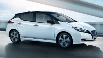 Nissan LEAF profile view driving-on a bridge