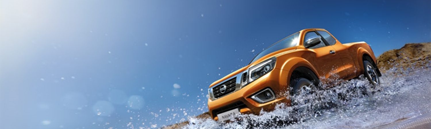 Nissan NAVARA AT32 parked on a cliff in the desert