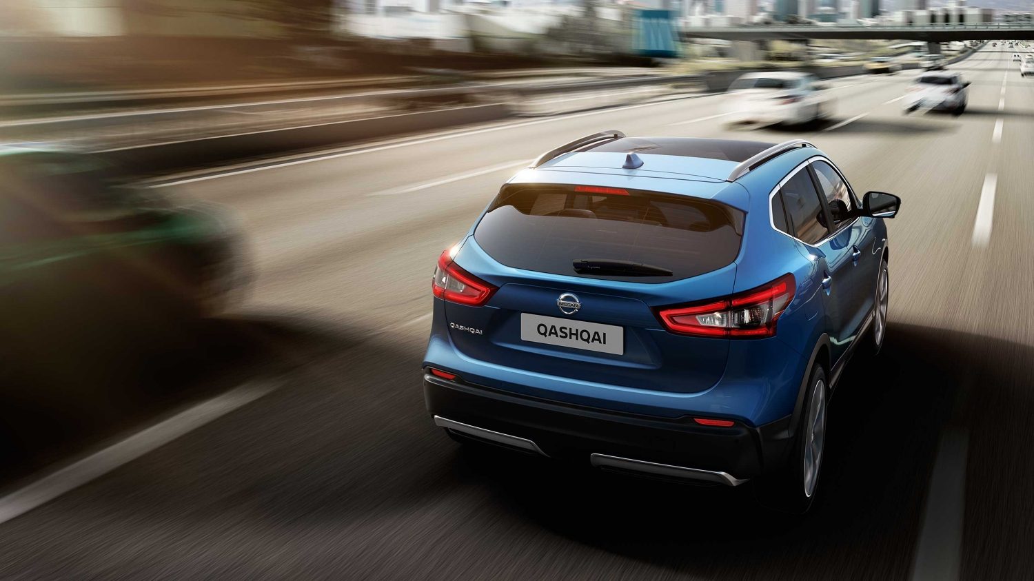 Qashqai rear driving shot on highway