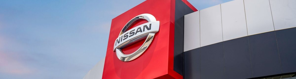 nissan logo on a showroom building