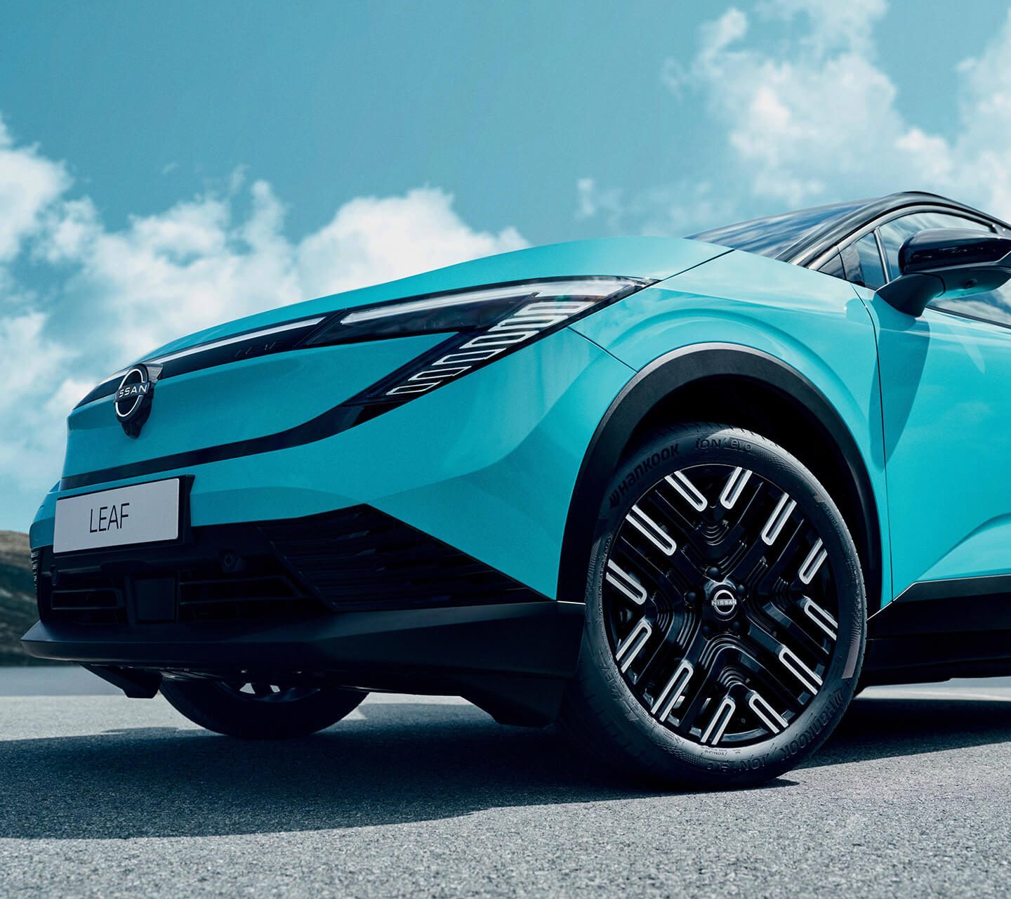 Bilde av turkis Nissan LEAF SUV elbil