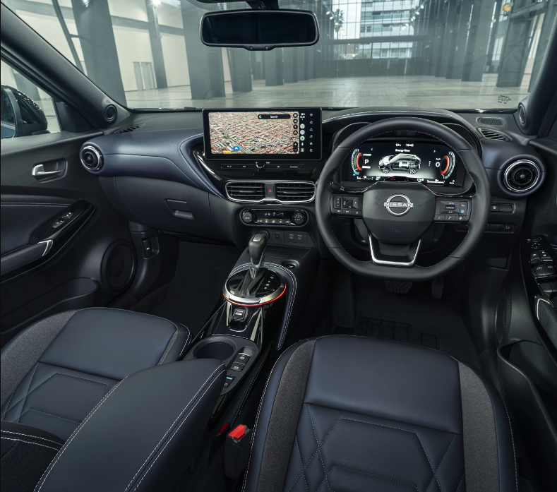 Nisan Juke interior front side view with driver