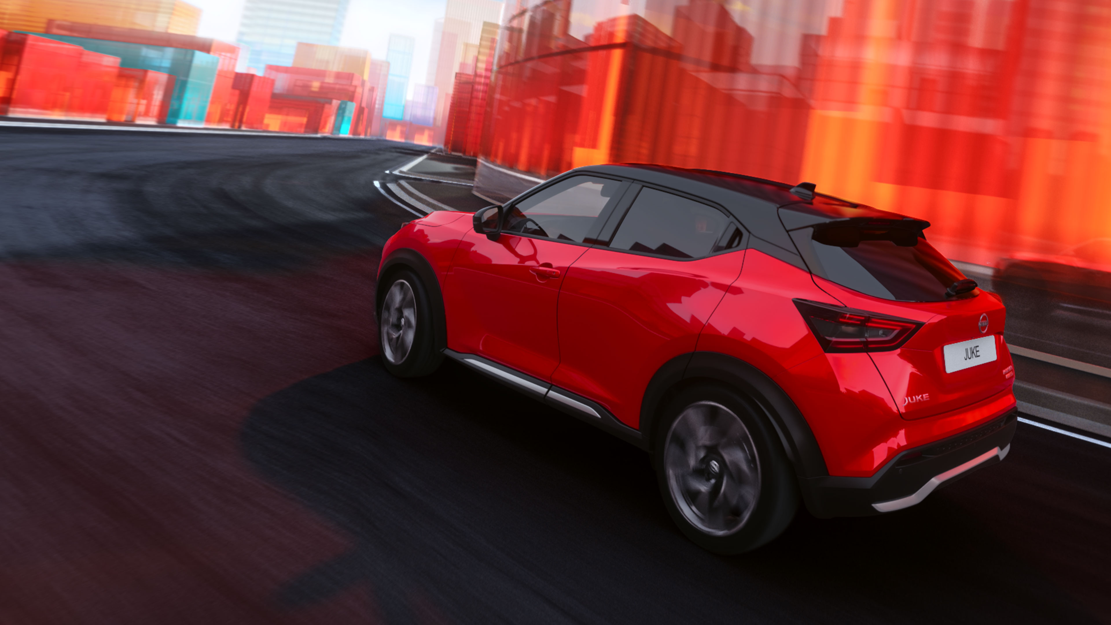 Ein Nissan Juke parkt vor einer Ladenzeile