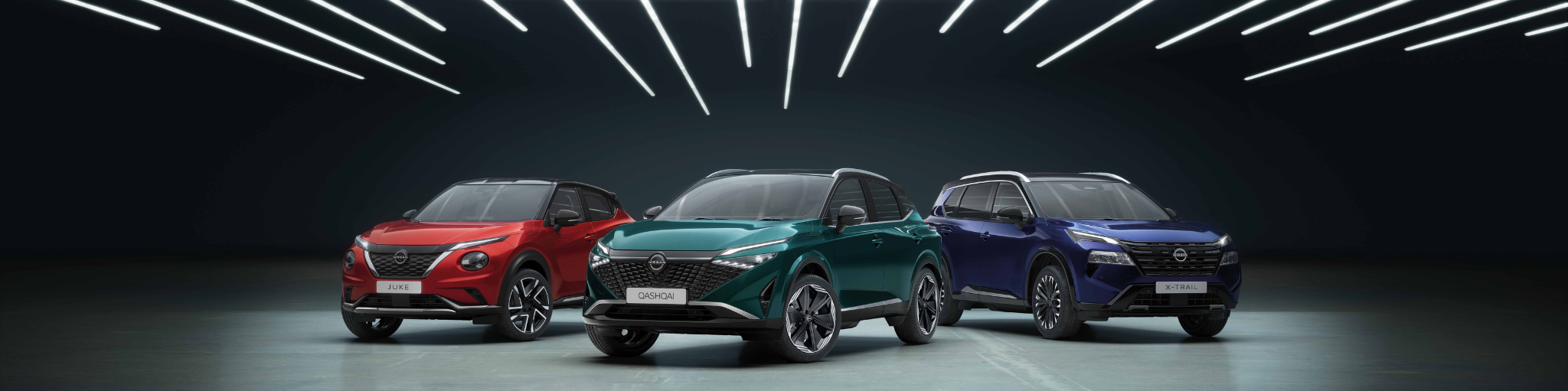 Nissan juke rojo, Nissan Qashqai verde y Nissan X-Trail azul
