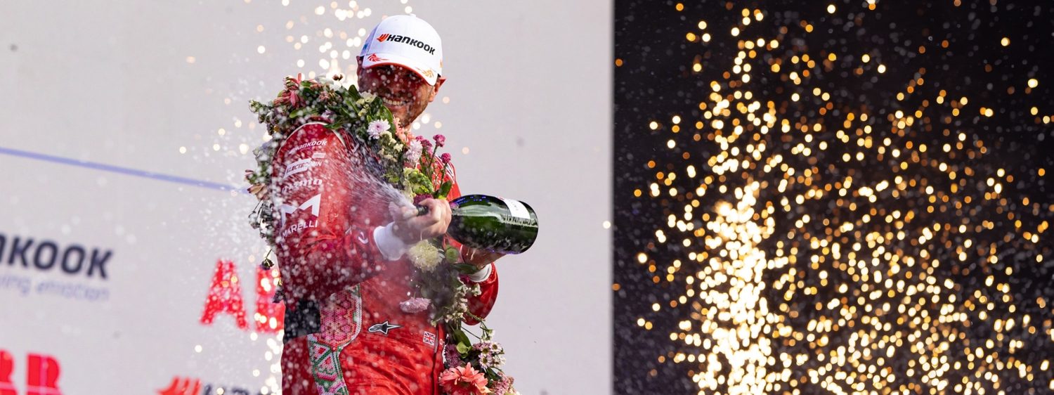 A man holding celebrating