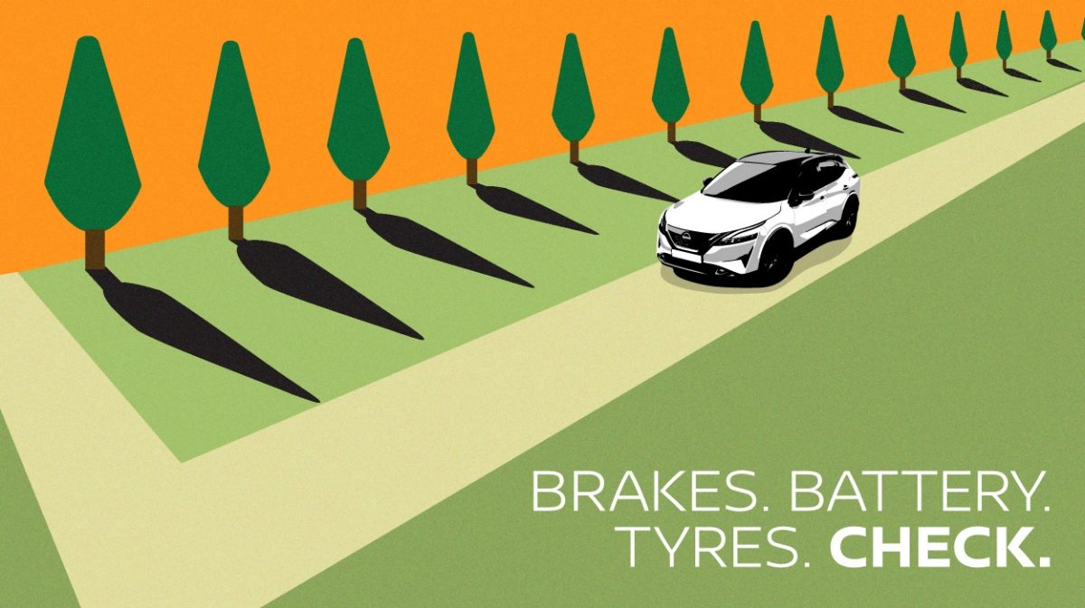 Nissan branded umbrella shielding man from rain