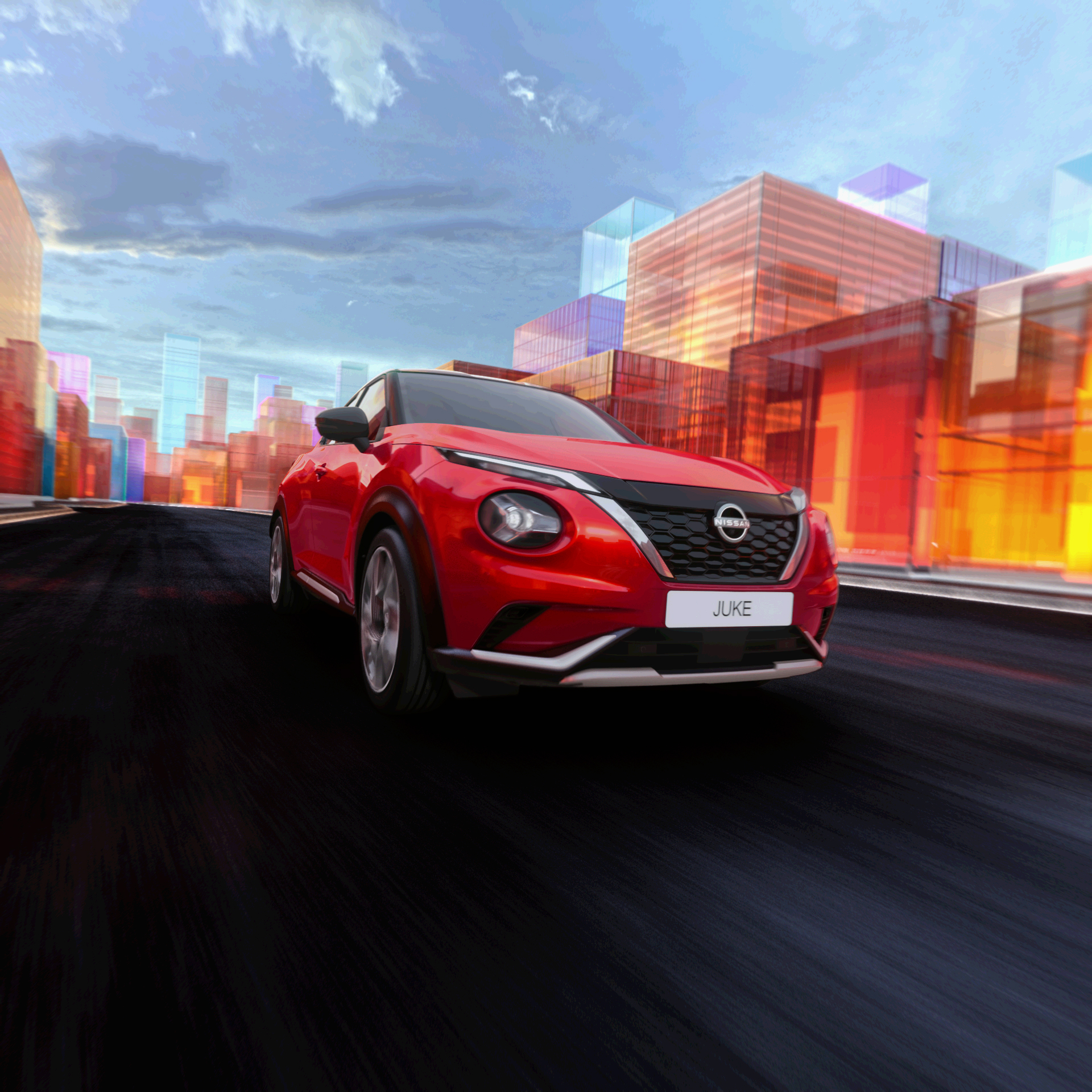 Nissan Juke profile view parked next to shop with person standing outside holding phone