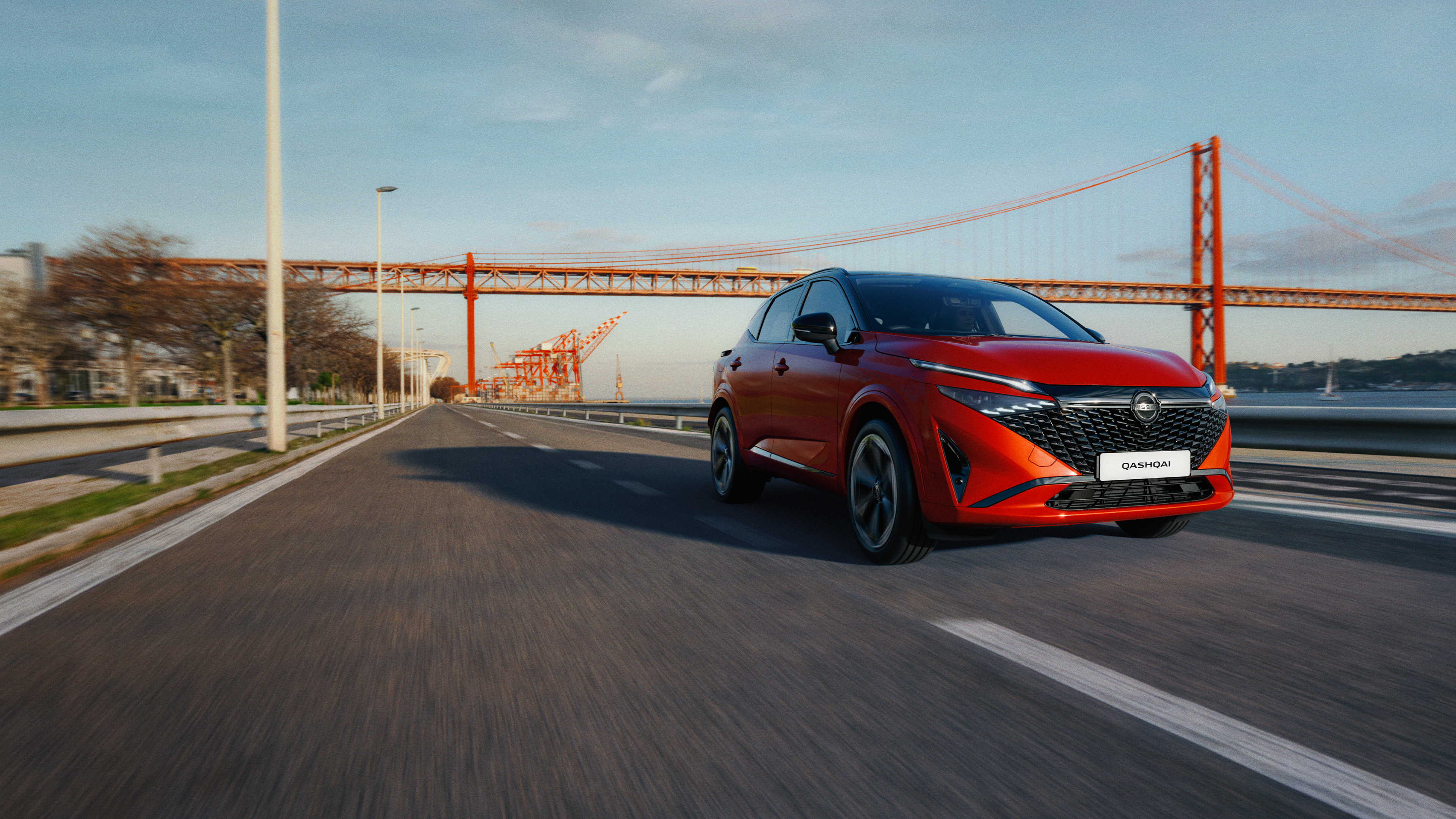 Nissan Qashqai e-Power driving shot on bridge - Hybrid SUV