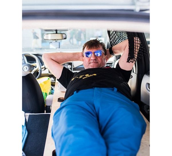 Marek Kaminski sleeping in his Nissan LEAF during his journey from Poland to Japan.