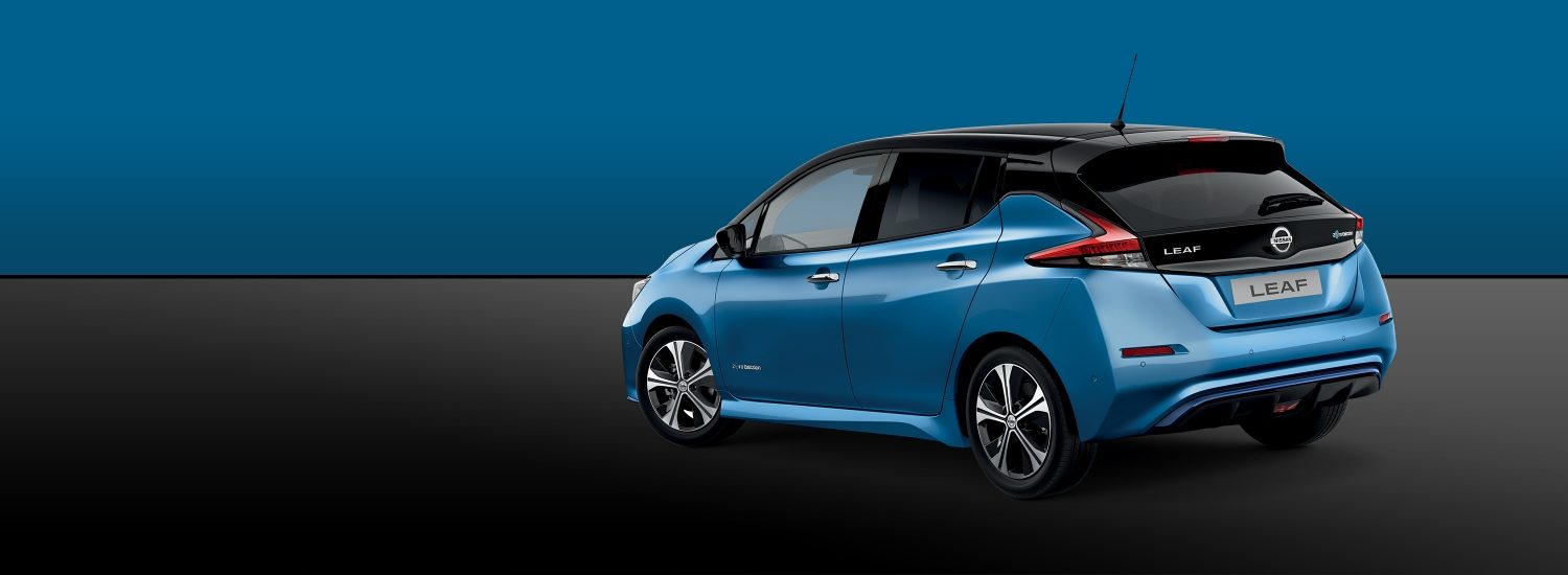 Simply Amazing New Nissan Leaf 100 Electric Car Nissan Leaf Two Tone White And Black Driving In The City