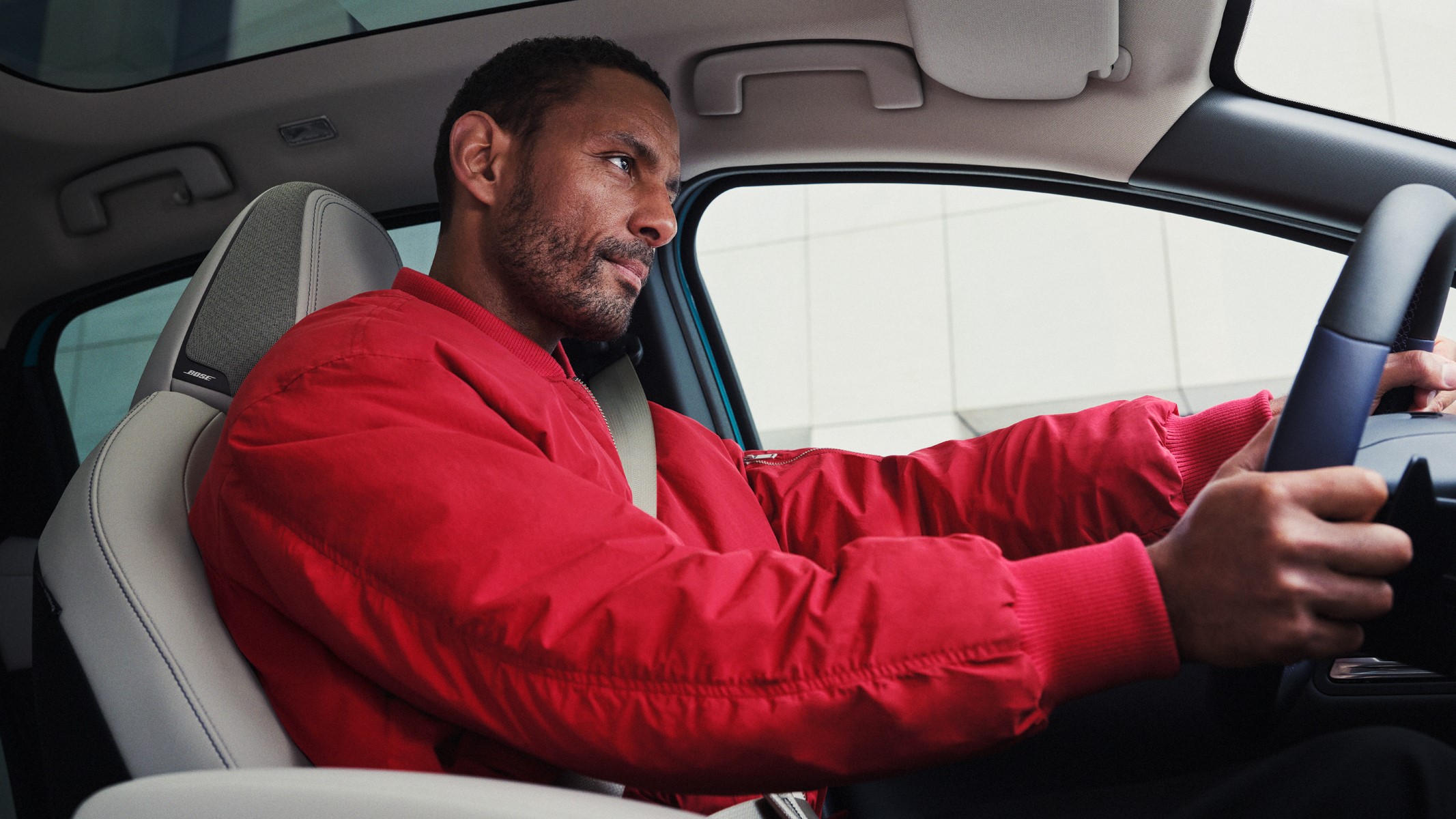 Driver inside Nissan Leaf