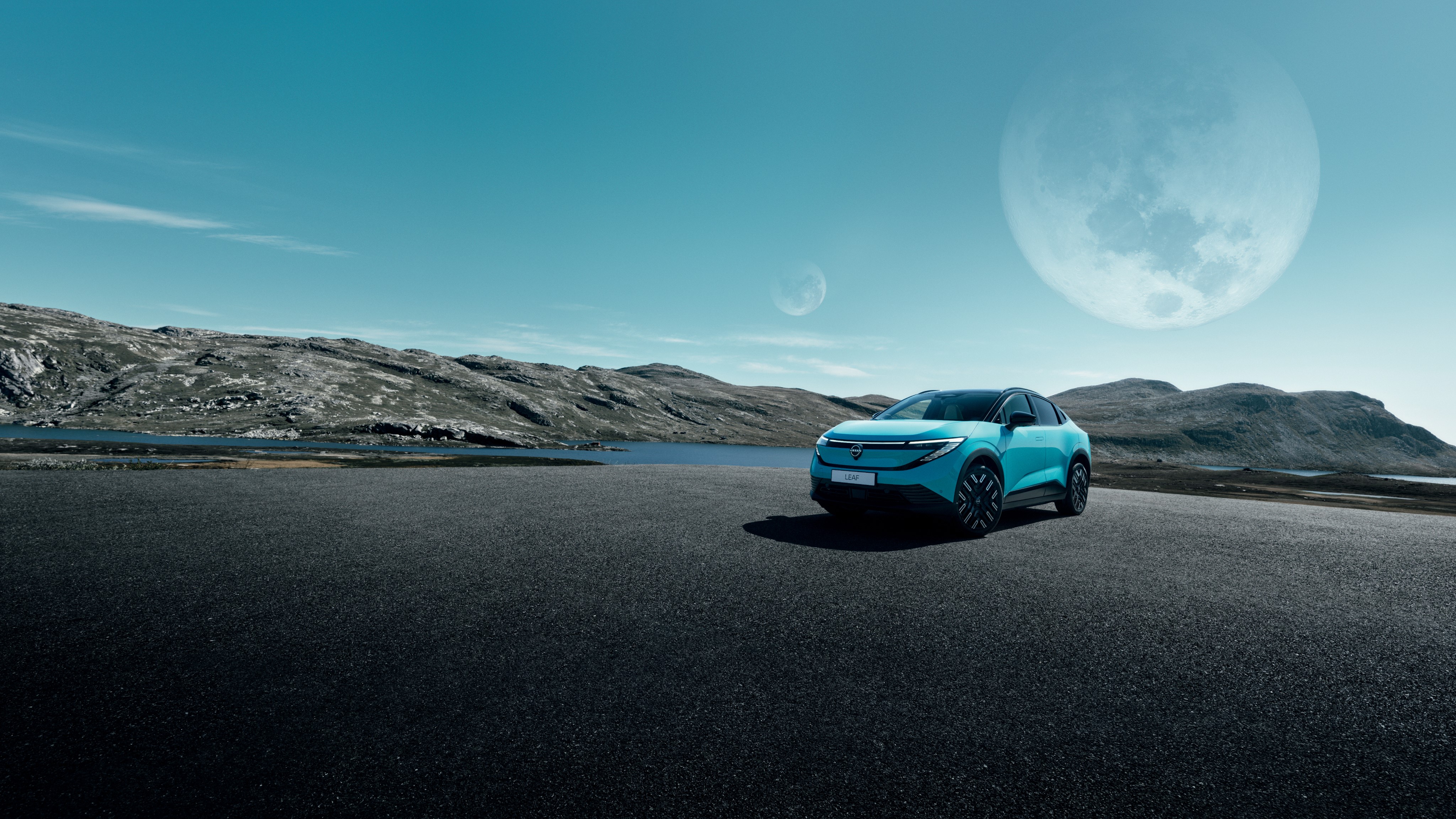 Nissan Leaf electric family car on mountain road