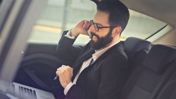 business man in a nissan car