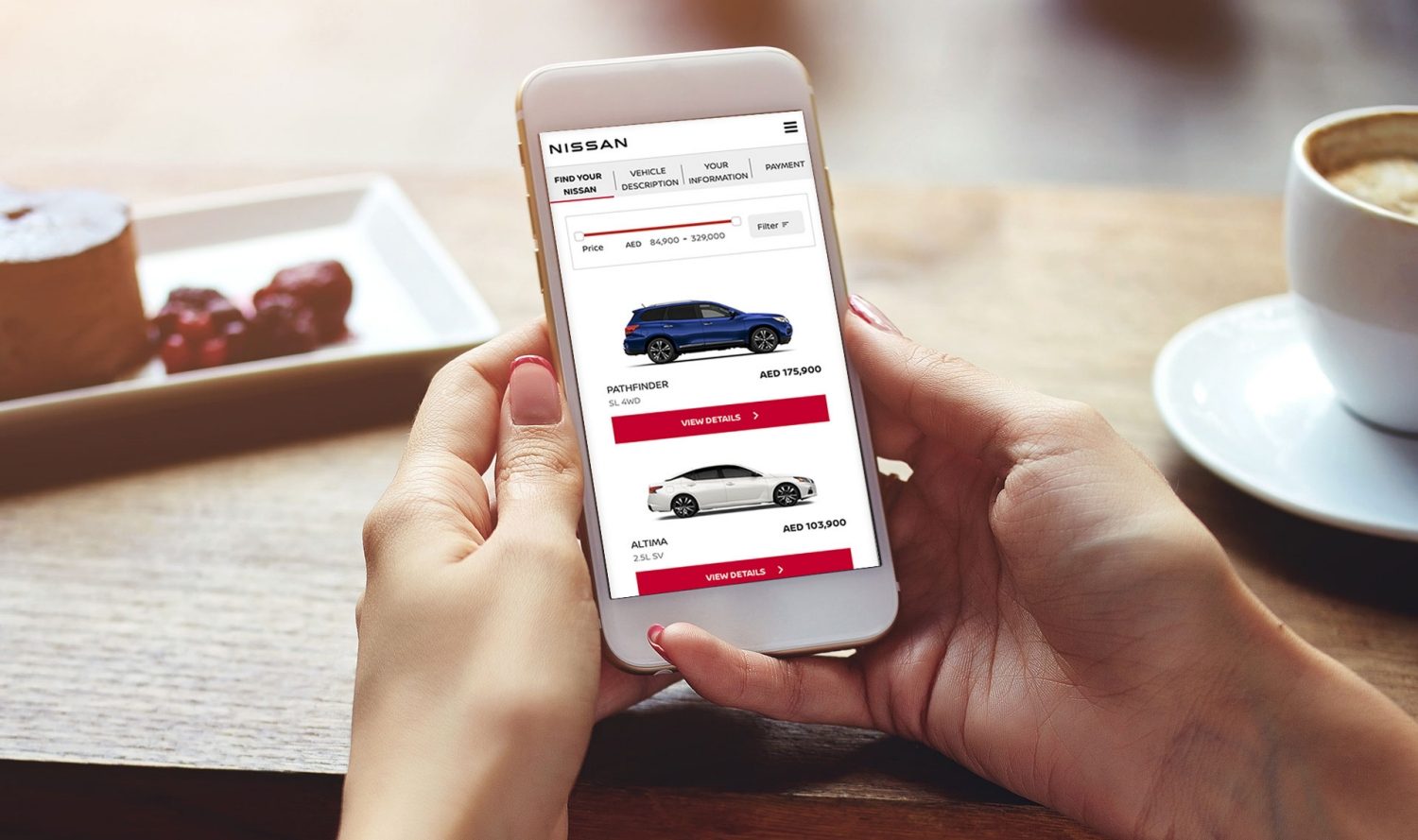 Woman navigating NISSAN site on a phone