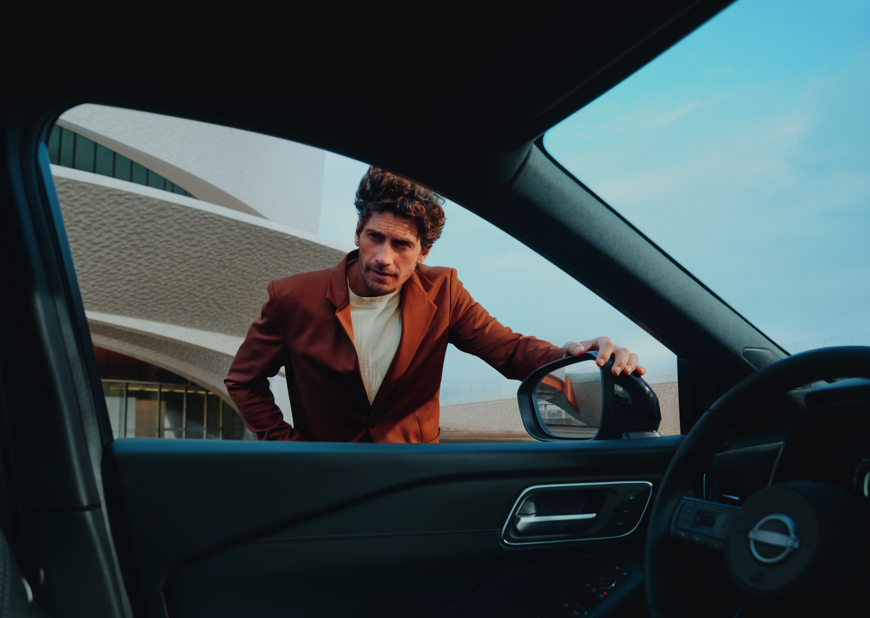 Nissan Qashqai e-Power driving shot on bridge - Hybrid SUV