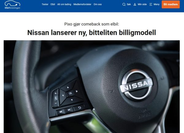 Bilde av Nissan ratt-logo på en elbil i elbil.no artikkel