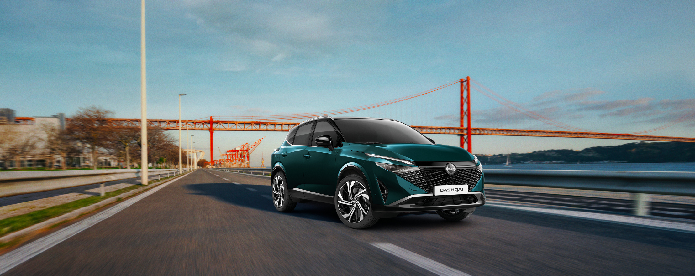 Car from a bird's-eye view driving across a road